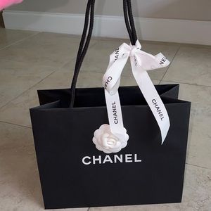 CHANEL paper bag with flower and bow